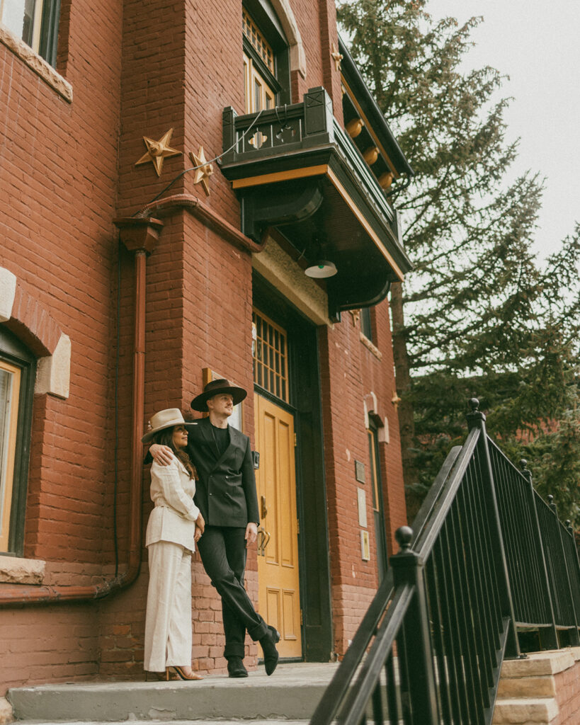 A couple on their elopement day outside of the Telluride, CO courthouse 